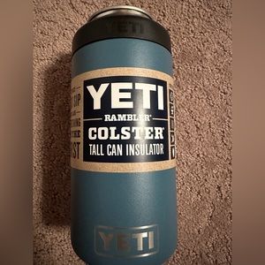 Yeti Rambler Colster Tall Can insulator with bonus yeti secret stasher tall can.